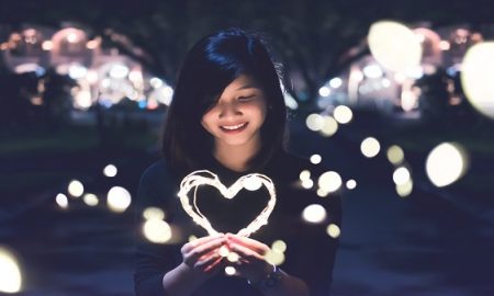 woman holding heart
